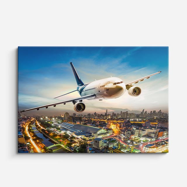 cuadro canvas vehículos avión blanco ciudad de noche horizontal