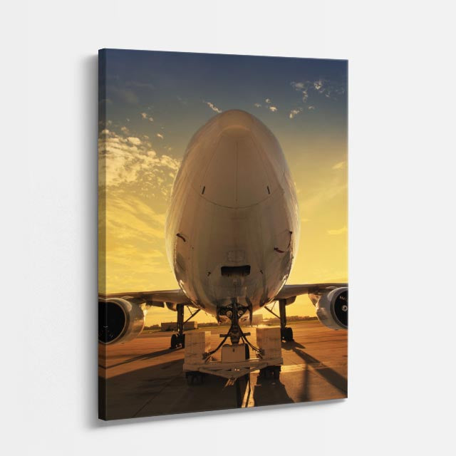 cuadro canvas vehículos avión carga atardecer dorado vertical