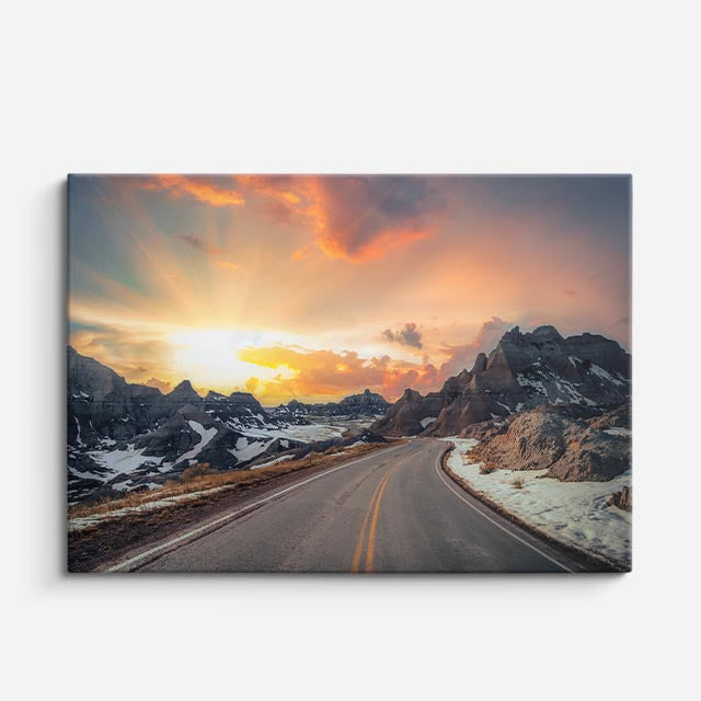 cuadro canvas montañas y nieve carretera nevada atardecer naranja horizontal