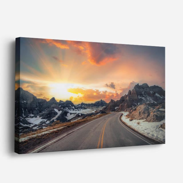 cuadro canvas montañas y nieve carretera nevada atardecer naranja horizontal