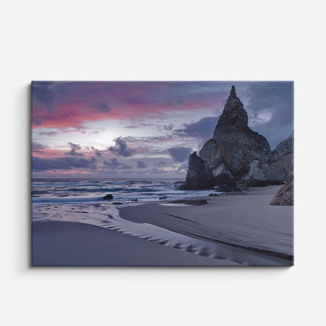 cuadro canvas mar y playa roca solitaria atardecer azul naranja horizontal