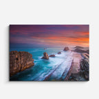 cuadro canvas mar y playa costa rocas atardecer dramático horizontal