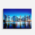 Cuadro canvas Ciudad Costera Nocturna Azul - Ciudades Urbano y Arquitectura - Vista Frente
